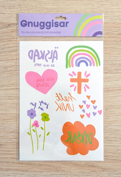 Gnuggis-tatuering violett