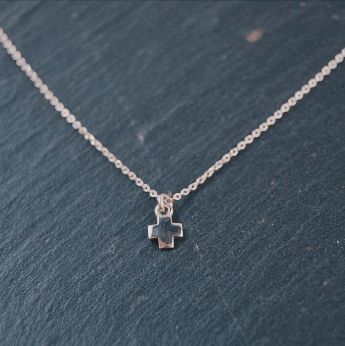 i23vLiksidigt guldkors