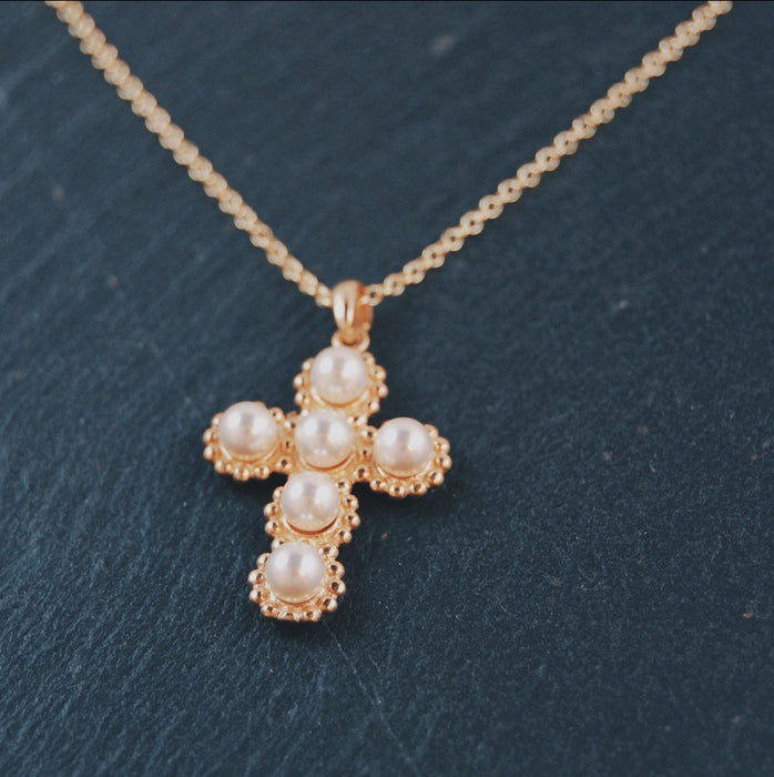 i58 Förgyllt pärlkors